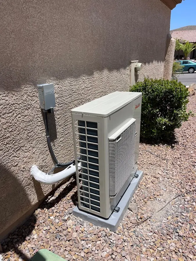Residential air conditioning condenser unit in Warren
